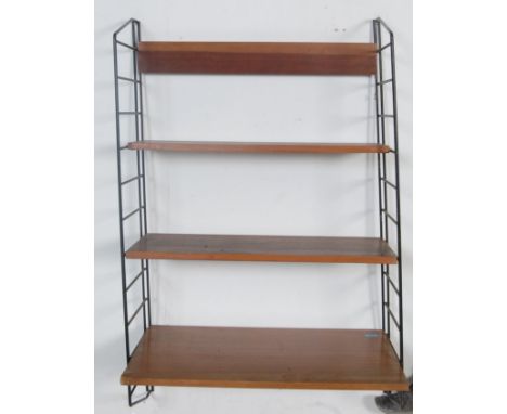 A set of vintage retro 20th century modular shelves / shelving unit in the manner of Ladderax. The set comprising of two meta