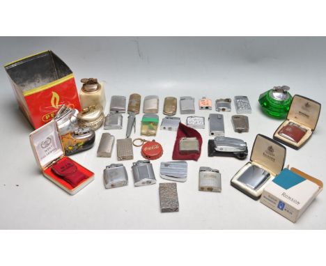 A collection of vintage retro cigarette lighters to include a selection of shapes and brands; Ronson, Colibu, Rolstar, Marlbo