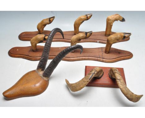 Of Taxidermy interest - A collection of early 20th century taxidermy to include two animal hoof coat racks having an oak back