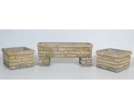 A group of three vintage 20th century Sandford Stone composition stone planters / garden planters. On of long rectangular for
