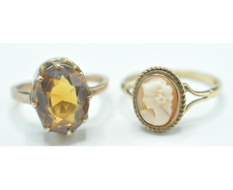 Two 20th Century 9ct gold rings to include a ring set with an oval cut citrine (unmarked but tests as 9ct gold, size K) and a