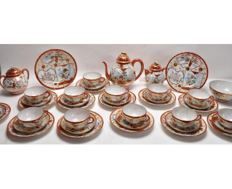 An antique Meiji period Japanese porcelain Kutani tea service. The twelve piece tea comprising twelve cups with saucers, a mi