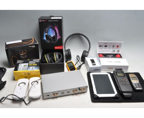 A collection of 20th century and 21st century telecommunications / mobile phone and Hi-Fi entertainment items to include a No