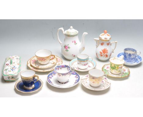 A collection of antique and later Victorian 19th Century chinaware to include cups, saucers, tricket pots, jugs and more. Col