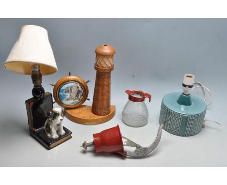A group of vintage retro desk / side lamps to include a ceramic bookend light in the form of two books with a puppy, a Poole 