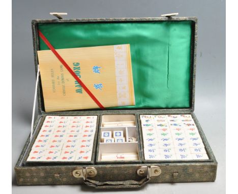 A vintage retro 20th century Chinese oriental Mah Jongg game set in original box with instructions and racks .&nbsp;