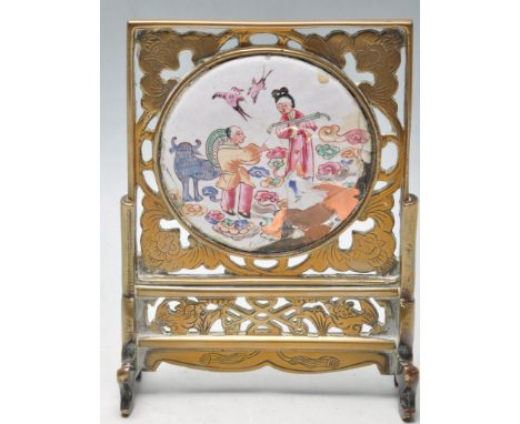 A 19th century Chinese brass and enamel hand painted pictorial table screen of miniature form.