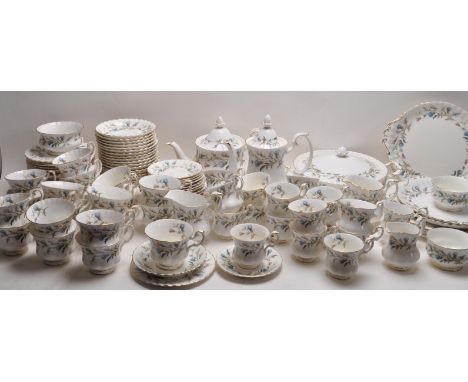 A large and extensive Royal Albert Brigadoon pattern dinner service comprising of cups, saucers, plates of various sizes and 