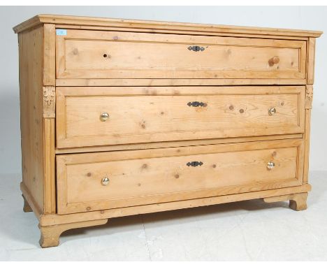 A large vintage late 20th century chest of drawers having a flared top over a bank of three spacious drawers with knob handle