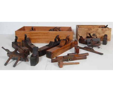 A large collection of vintage woodworking tools comprising of ploughs, moulding planes and more. Local branding to the tools 