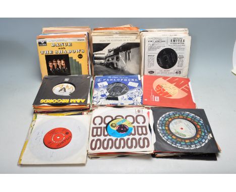 A collection of vintage vinyl 7" 45s singles records from the 1960s, 1970s, 1980s, 1990s to include Bob Marley, Sarah Vaughan