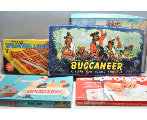 A collection of vintage retro 20th century board games to include Waddington’s Buccaneer, Railroader, New Spirograph Operatio