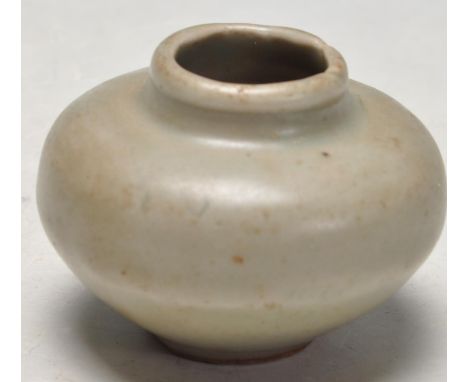 An antique chinese Longquan Song Dynasty celadon monochrome ink pot / squat vase. 42mm high