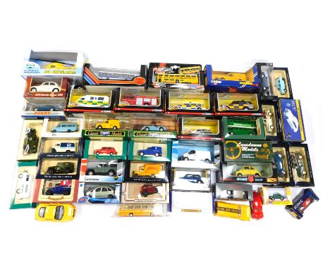 A quantity of diecast vehicles, to include Corgi Wheels, Classic Corgi models, 1-32 scale Fiat, Dinky, and other diecast and 