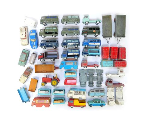 A group of diecast vehicles, play worn, to include Corgi Commer three quarter tonne chassis, police cars, Army ambulance, a D