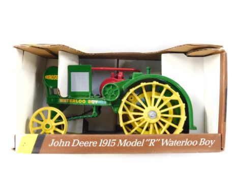 An Ertl John Deere 1950 model R Waterloo Boy tractor, boxed. 
