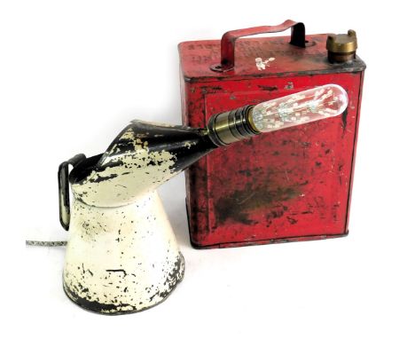 A Shell petrol can, together with an oil can converted to a table lamp.