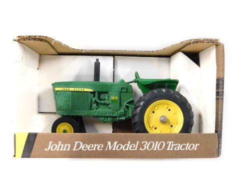 An Ertl John Deere 1960 model 3010 tractor, boxed. 