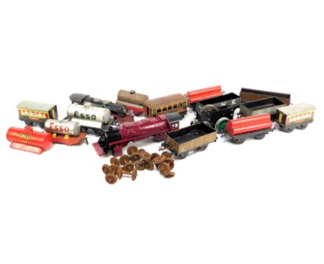 Hornby and other tinplate O gauge, including a Hornby 0-4-0 locomotive clockwork chassis, BP tanker, seven plank wagon, Pullm