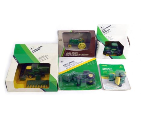 A group of agricultural diecast vehicles, comprising an Ertl John Deere round bailer, John Deere 7800 row drop tractor with e