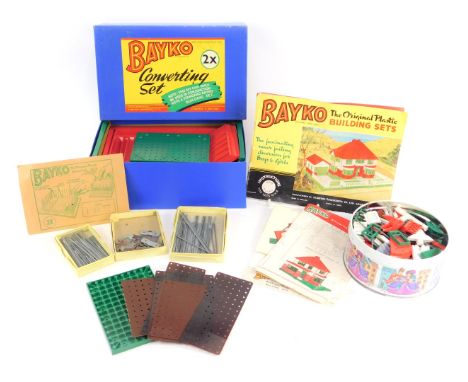 A Bayko 1X Converting Set, Bayko 2X converting set, and a biscuit tin of Bayko accessories. 