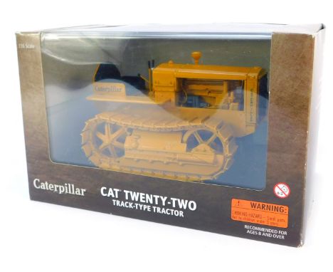 A Caterpillar Cat Twenty-Two track type diecast tractor, 1:16 scale, boxed. 