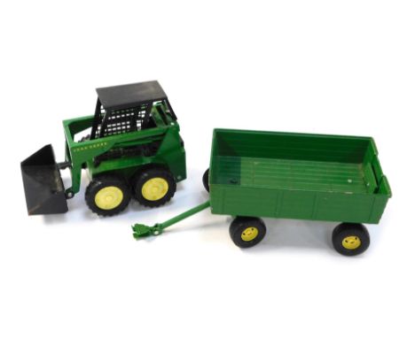 An Ertl John Deere tractor, number 5889, and a twin axle trailer. (2) 
