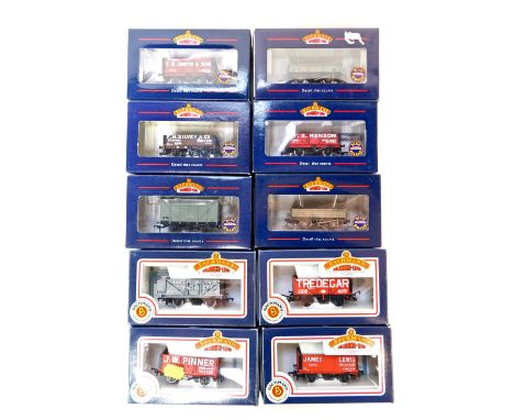 A group of Bachmann Branchline OO gauge rolling stock, to include seven plank wagon, 12 tonne ventilated van BR grey, 13 tonn