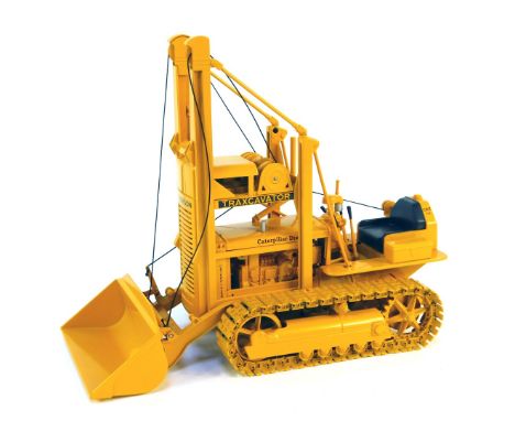 A Caterpillar D2 track type diecast tractor, 5U series Traxcavator, offered exclusively by Antique Caterpillar Machinery Owne