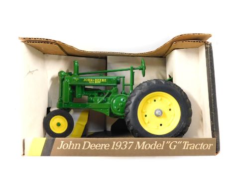 An Ertl John Deere 1937 model G tractor, boxed. 