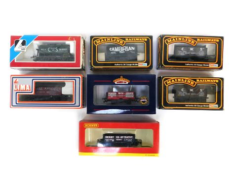 Lima Mainline and Hornby OO gauge rolling stock, comprising Bachmann five plank wagon, Mainline Railways seven plank wagon, H