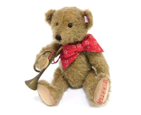 A Steiff mohair musical Anton Teddy Bear, limited edition 404/1225, 35cm high, boxed with certificate.