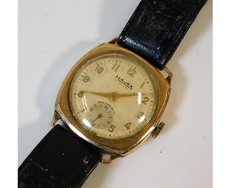 A gents vintage 9ct gold wrist watch with leather strap, not running 