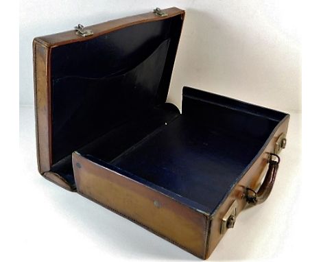 A vintage leather briefcase 15.5in wide x 11.5in deep x 4in high