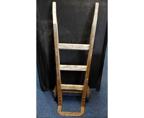 A set of vintage iron reinforced oak trucks, maker R. D. Mills, Bootle, Liverpool 
