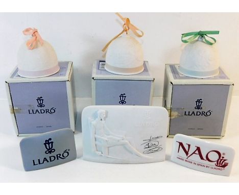 Three boxed Lladro bells &amp; three Lladro/Nao plaques