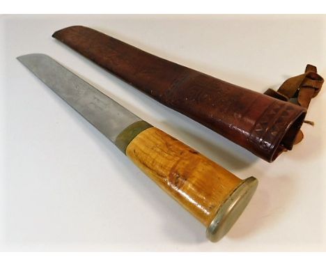 A vintage J Marttiini of Finland fixed blade knife 16.5in long