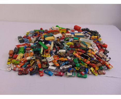 A quantity of diecast model cars, trucks and accessories