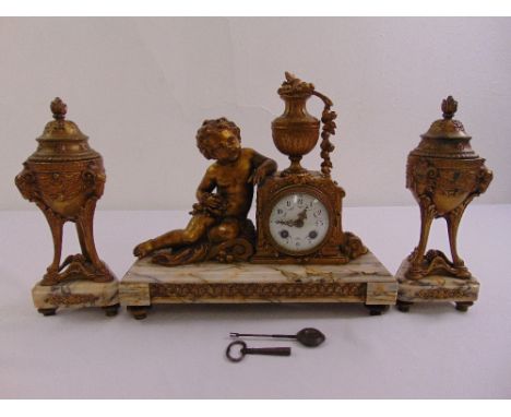 A gilded metal and marble clock set with white enamel dial, Roman numerals, two train movement to include key and pendulum