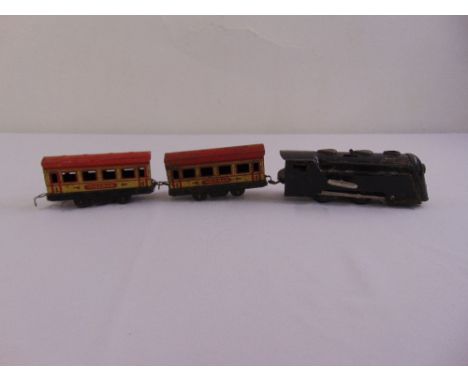 A Tin plate model railway to include engine and two carriages, A/F
