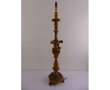 An Italian mid 20th century carved and gilded lamp stand on raised conical base, 139cm (h)