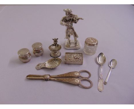 A quantity of silver and white metal to include a snuff box, a pair of grape scissors, a caddy spoon a figurine and covered b