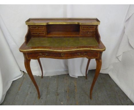 A Louis XVI style rectangular desk with gallery shelf, on four cabriole legs