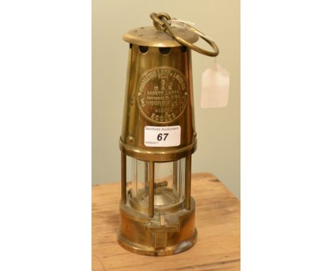 A brass miners lamp, by Eccles, stamped Mansfield '84