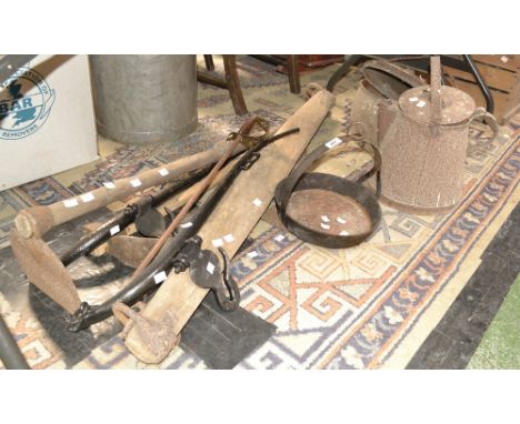 A pair of vintage horse hames; a yoke; two hoes; a vintage kettle and range skillet