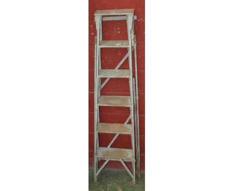 A vintage wooden step ladder