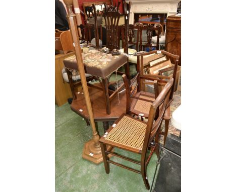 An Edwardian mahogany occasional table; three Edwardian chairs; a George III mahogany dining chair, circa 1810; a 20th centur