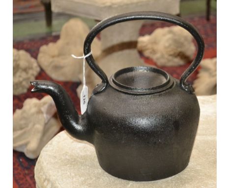 A reproduction cast iron kettle 