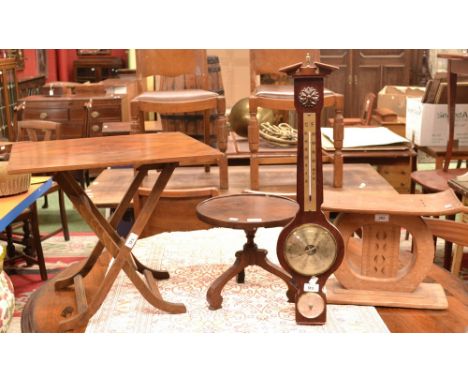 An Ashanti stool; a mahogany tripod occasional table; a walnut folding table; a barometer (4)