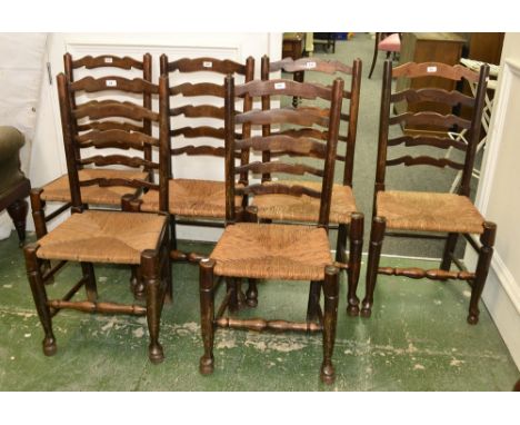 A harlequin set of six Lancashire elm ladder back dining chairs